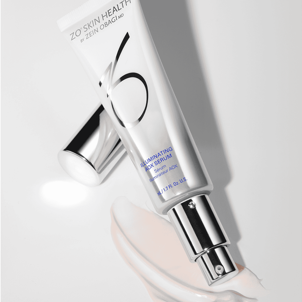 Illuminating skin serum in sleek silver tube, promoting healthy, radiant skin.