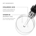 Close-up of hyaluronic acid and vitamin B5 serum in a petri dish with dropper.