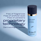 Skincare serum bottle with text highlighting fragrance-free, dye-free, paraben-free benefits.