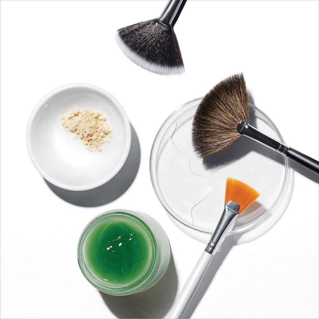 Skincare tools and products for facial cleansing and beauty routines.