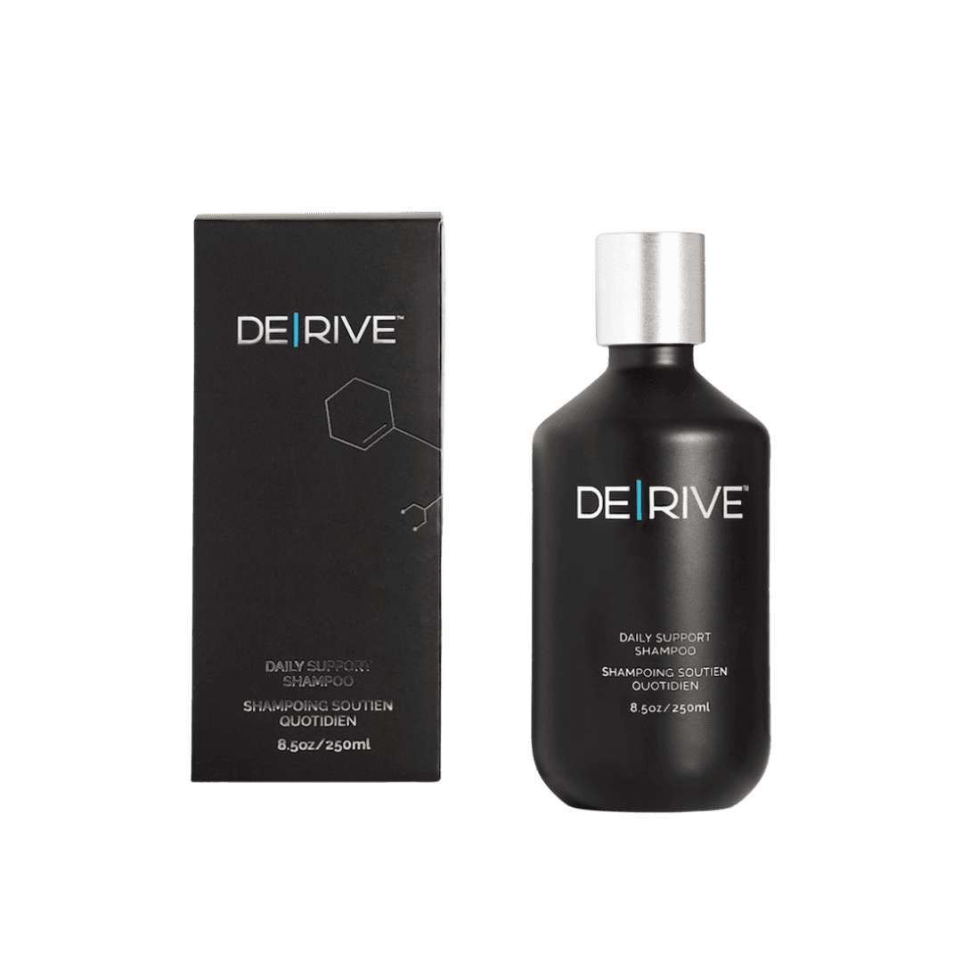 DE|RIVE Daily Support Shampoo bottle with black packaging for hair health and scalp care.